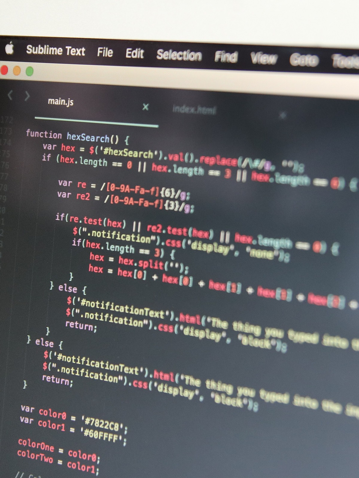 Software code displayed on a technology business laptop